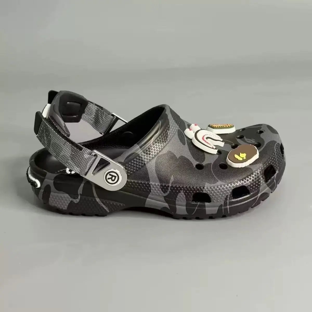 Crocs Sandals Ventilated clogs with heel straps and decorative charms — 7
