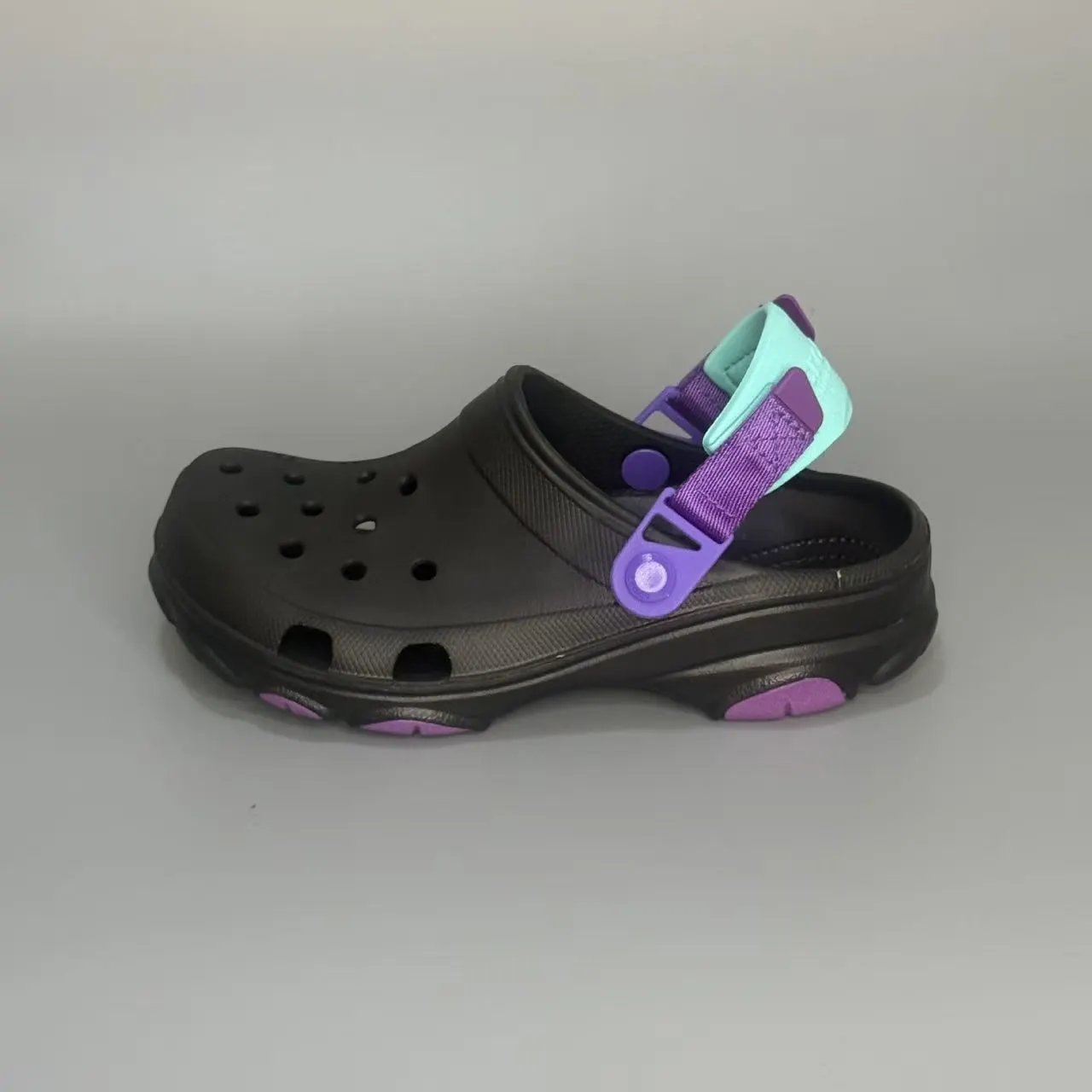 Crocs Sandals Ventilated clogs with heel straps and decorative charms — 24