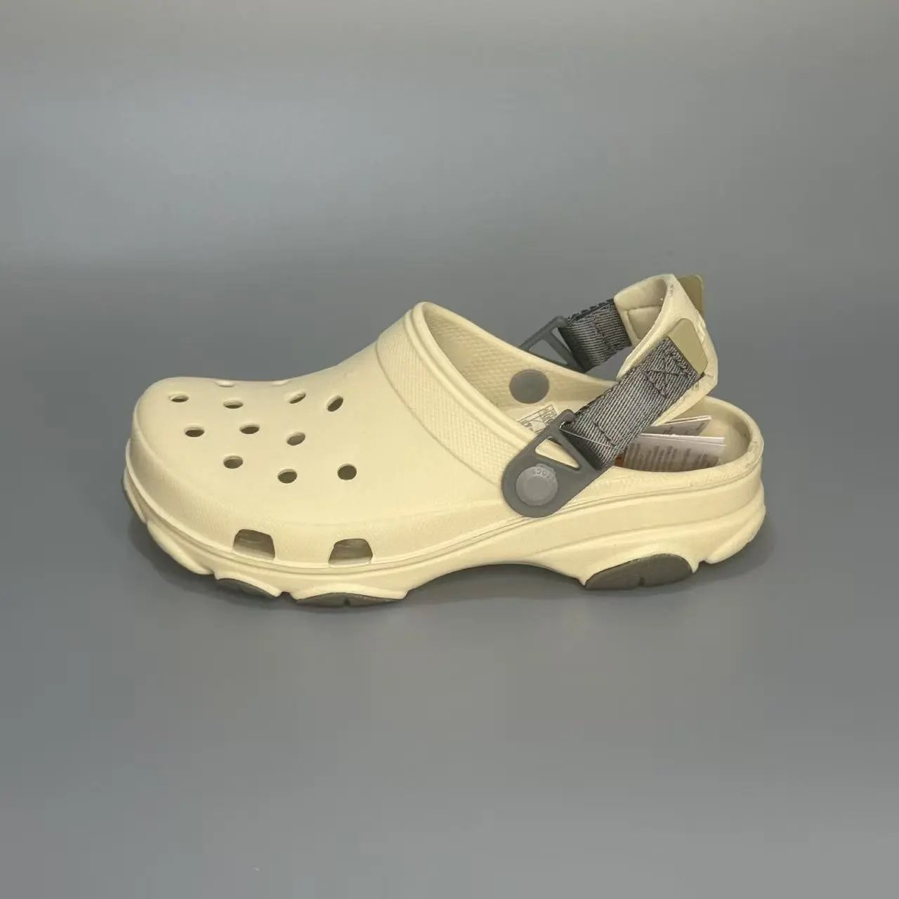Crocs Sandals Ventilated clogs with heel straps and decorative charms — 29