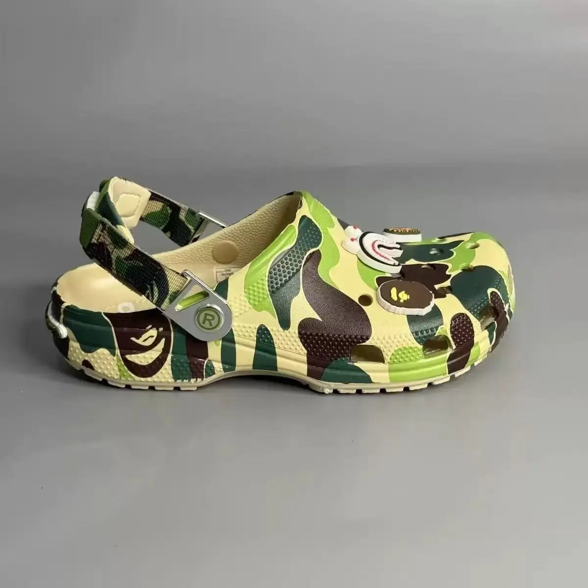 Crocs Sandals Ventilated clogs with heel straps and decorative charms — 22
