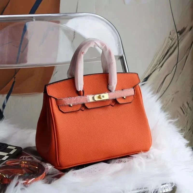 Unbranded Crossbody Bags Bowling bag with multicolour cross appliqués — Hermès – Orange