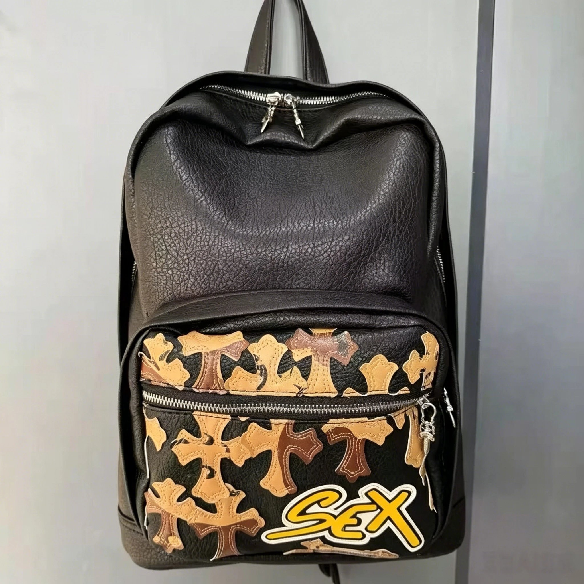 Unbranded Crossbody Bags Bowling bag with multicolour cross appliqués — Karl Lagerfeld backpack – black and brown