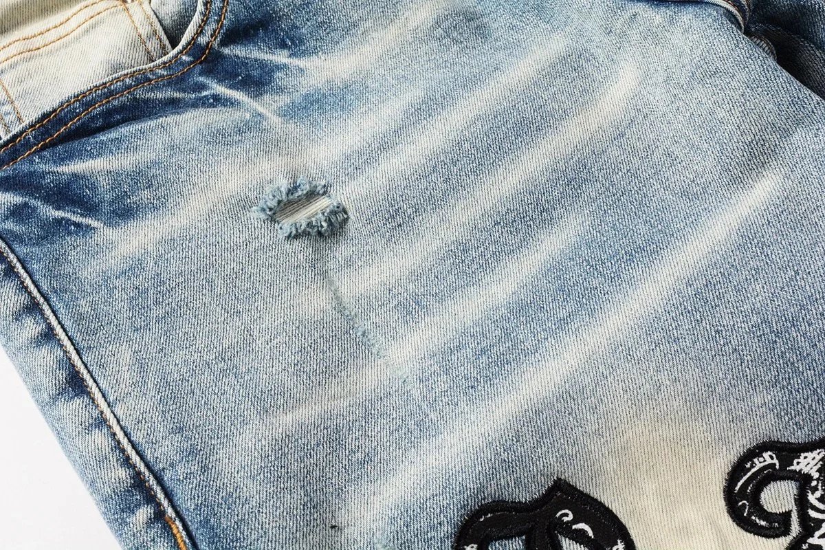 AMIRI three-label ripped jeans product detail 3