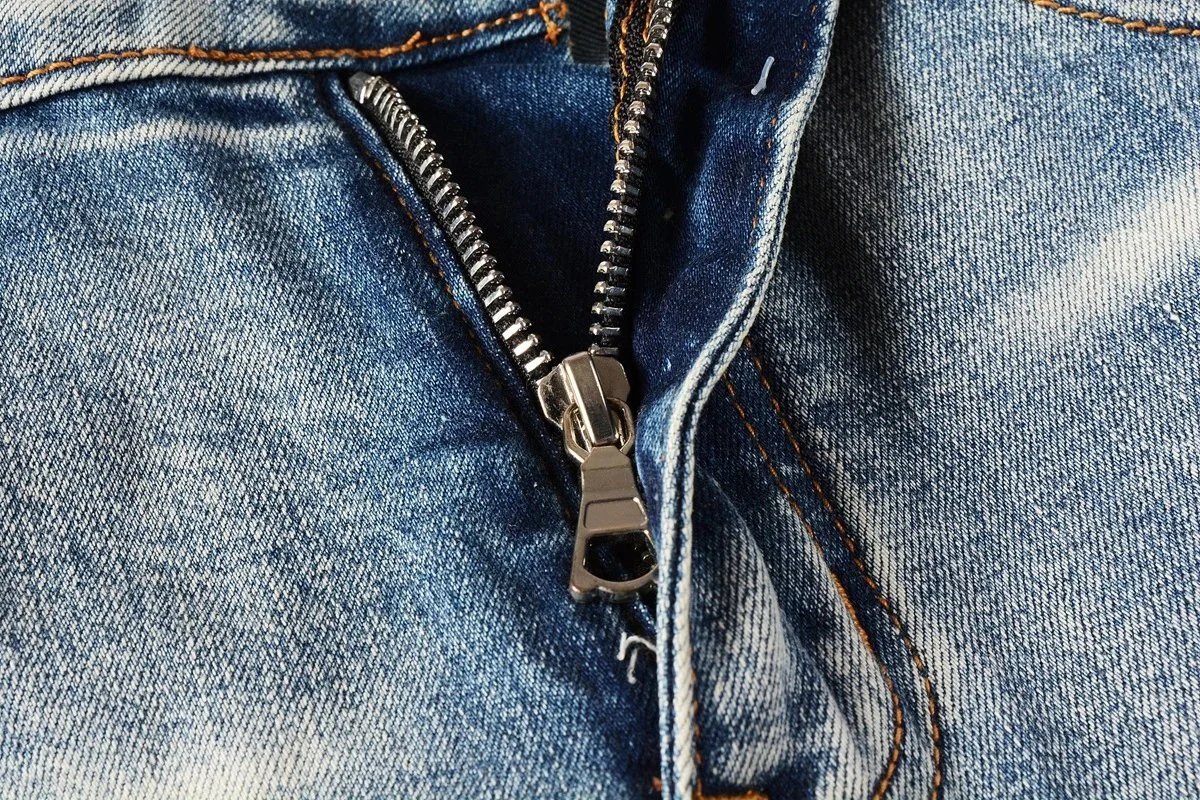 AMIRI three-label ripped jeans product detail 6