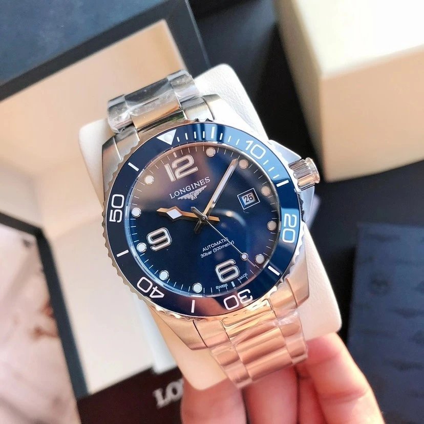 Longines automatisch horloge met blauwe wijzerplaat en metalen schakelband