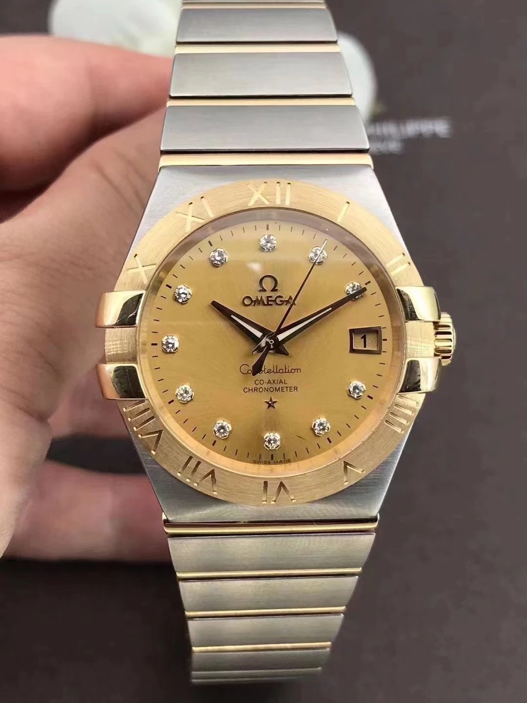 Omega Constellation bicolor horloge met goudkleurige wijzerplaat