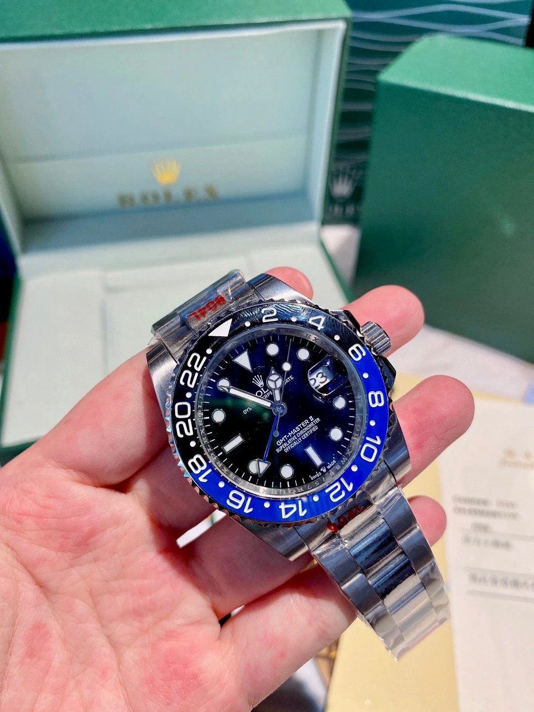 Reloj de acero Rolex GMT-Master II con bisel azul y negro