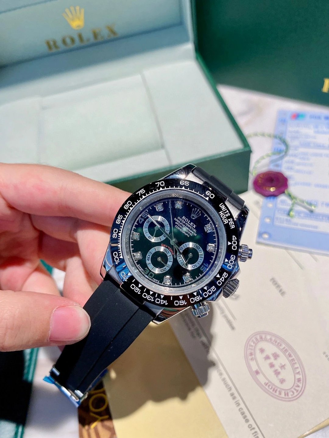 Reloj cronógrafo Rolex Daytona con esfera negra y correa de caucho negra