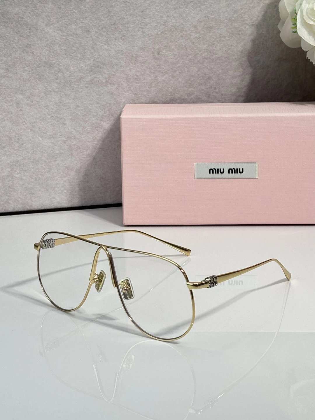 Miu Miu SMUA58 Sunglasses — photo 2