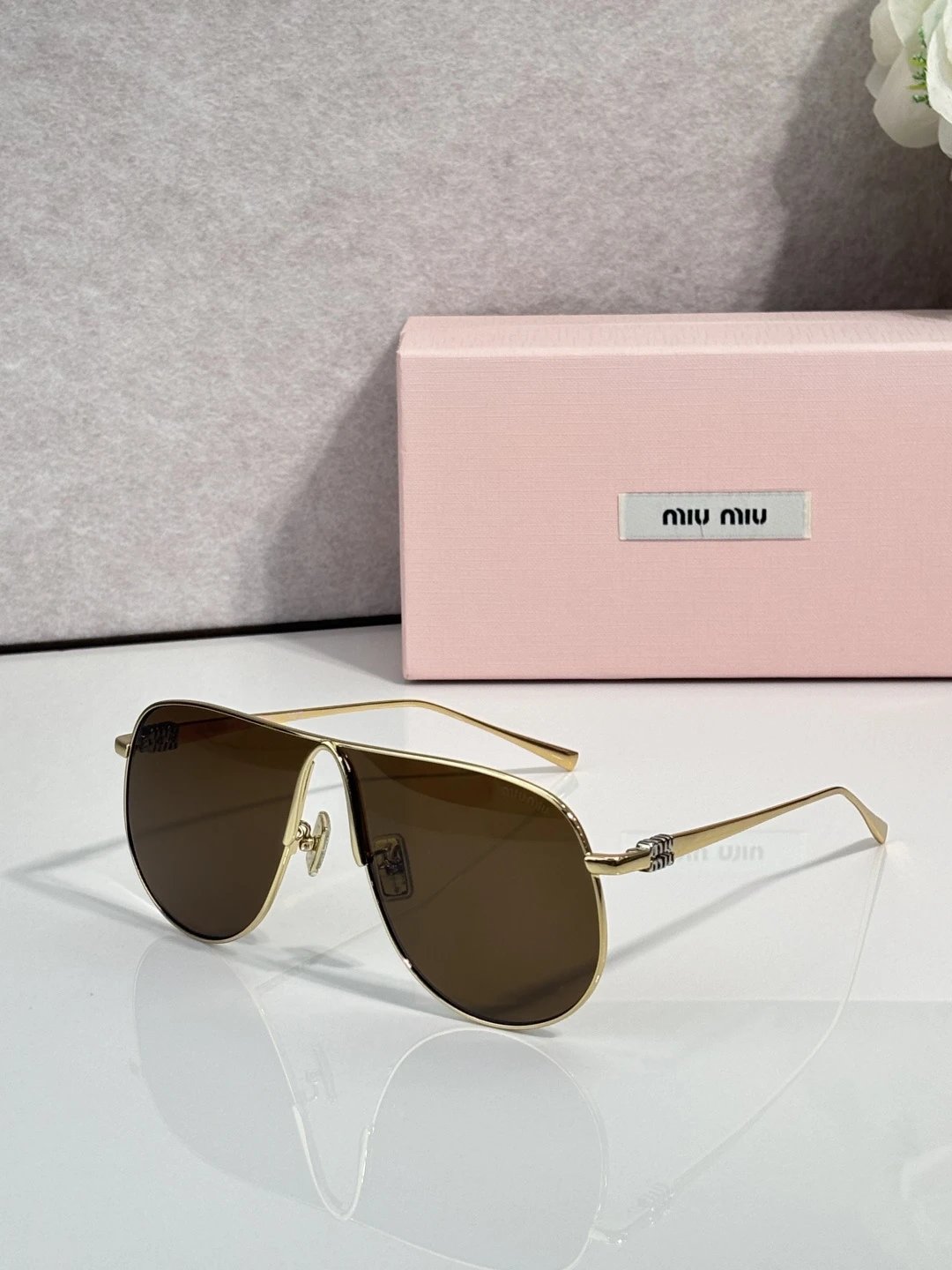 Miu Miu SMUA58 Sunglasses — photo 3