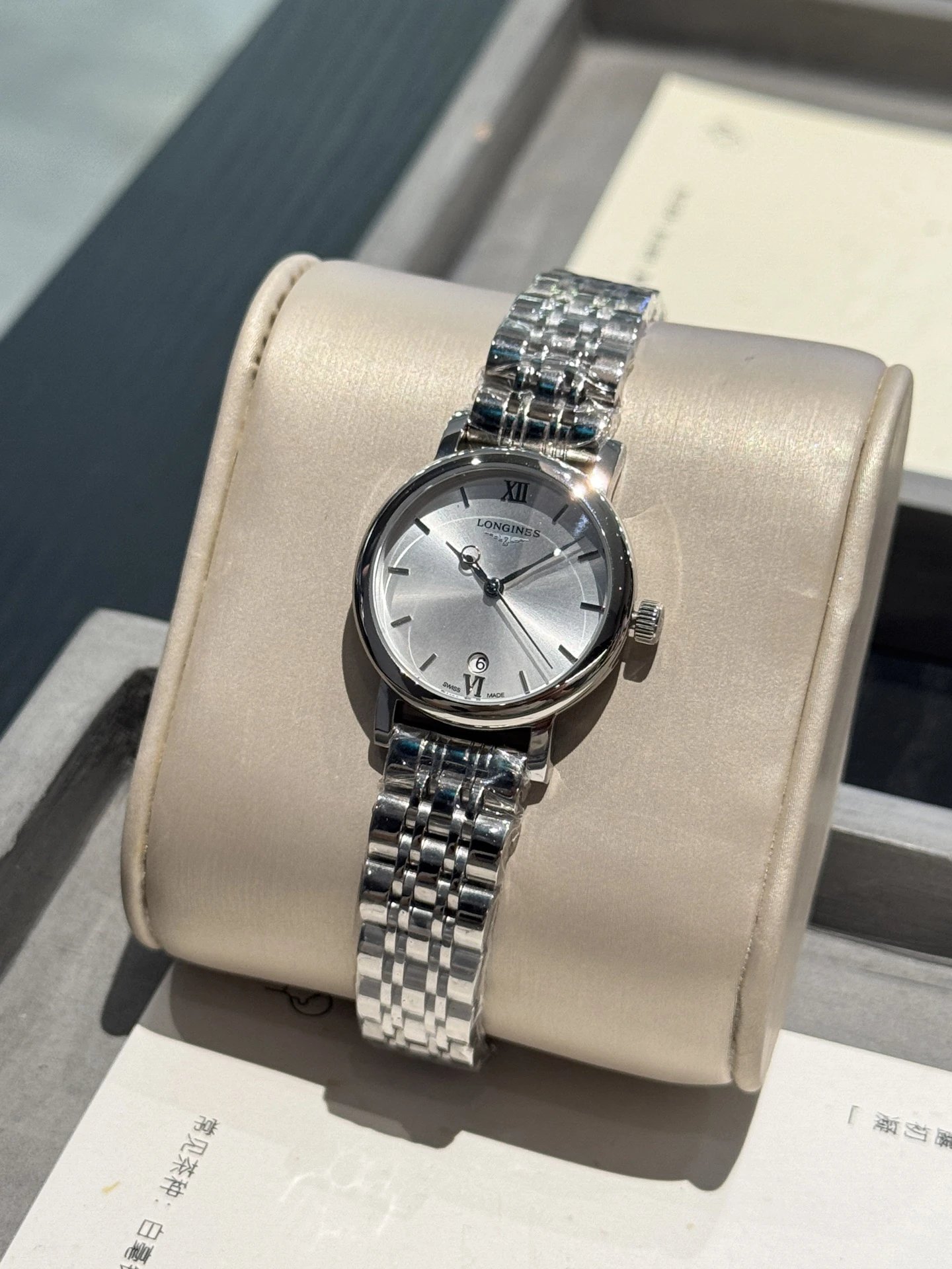 Longines roestvrijstalen horloge met zilveren wijzerplaat en Romeinse cijfers