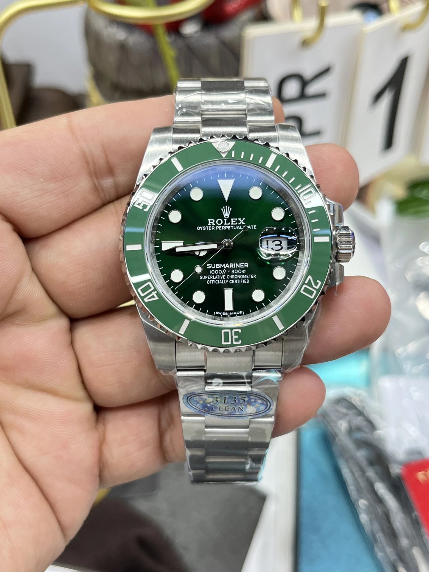 Reloj Rolex Submariner Oyster Perpetual Date con esfera y bisel verdes