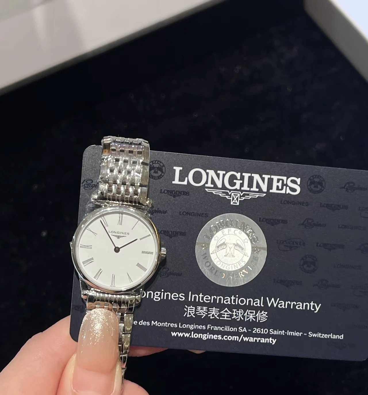 Longines Watch with White Roman Numeral Dial and Stainless Steel Bracelet
