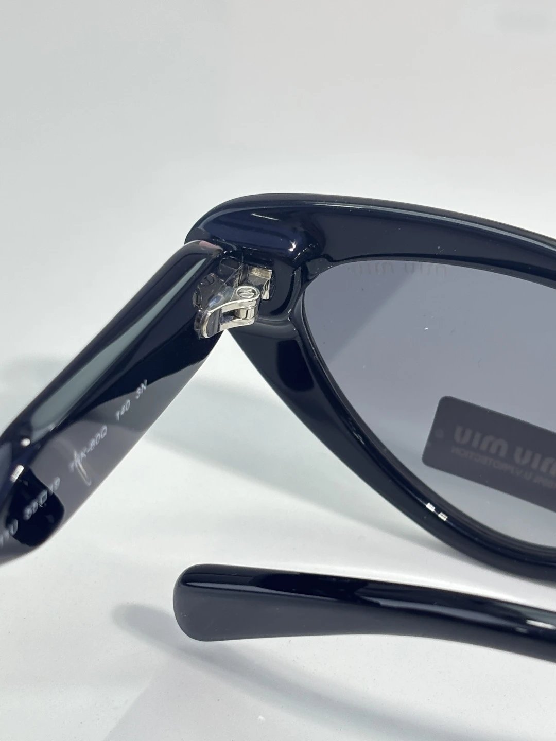 Miu Miu SMUB11U Sunglasses 55-19-140 — photo 9