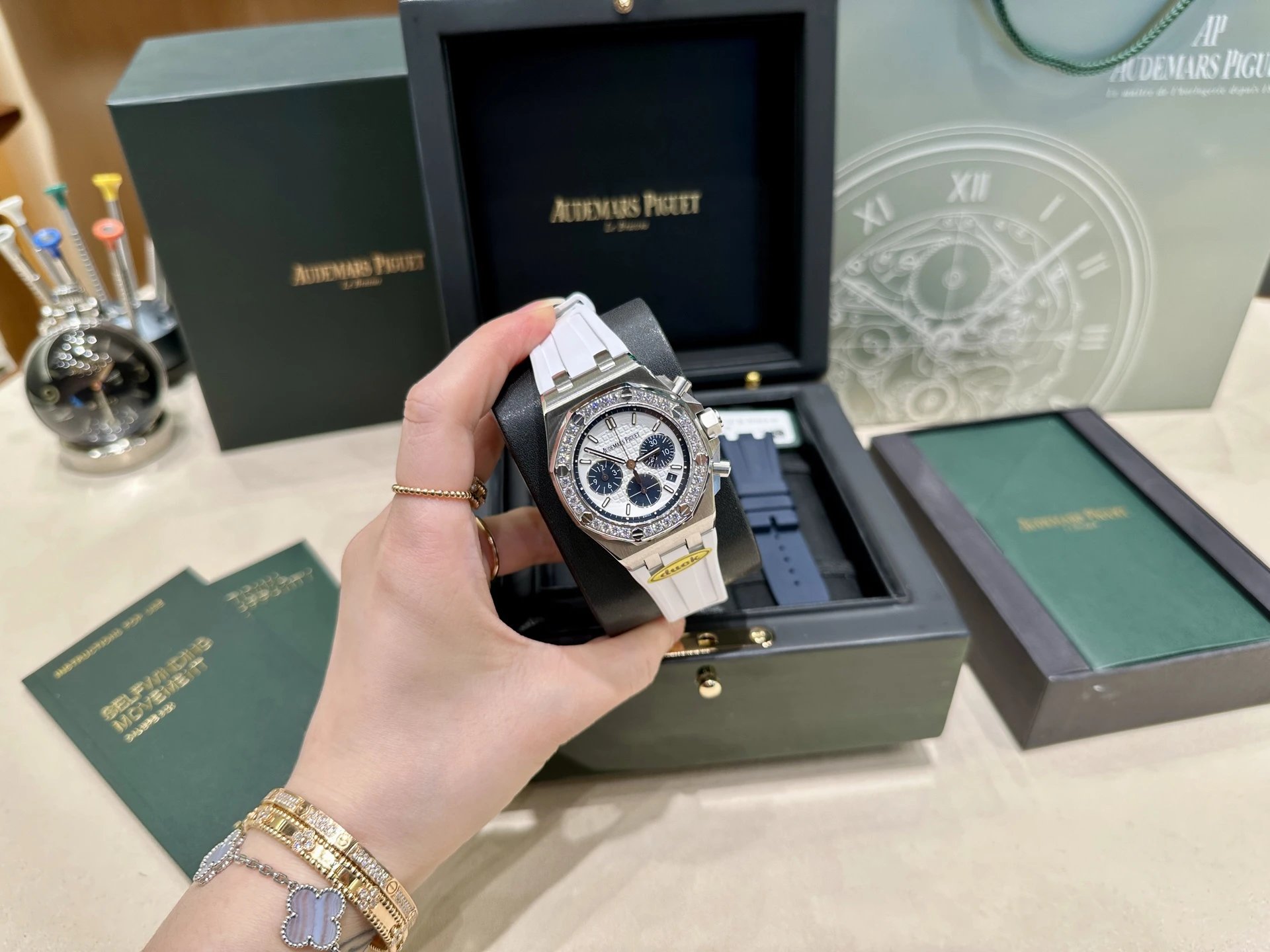 Audemars Piguet Chronograph Watch with Gem-Set Bezel and White Rubber Strap