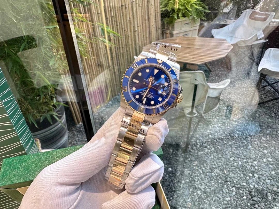 Bicolor Rolex Submariner horloge met blauwe wijzerplaat en lunette