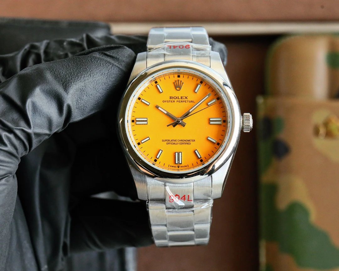 Rolex Oyster Perpetual roestvrijstalen horloge met oranje wijzerplaat