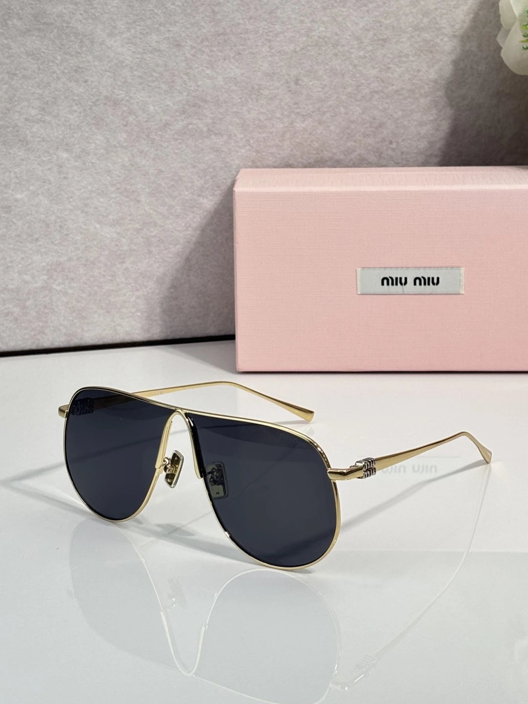 Miu Miu SMUA58 Sunglasses — photo 4