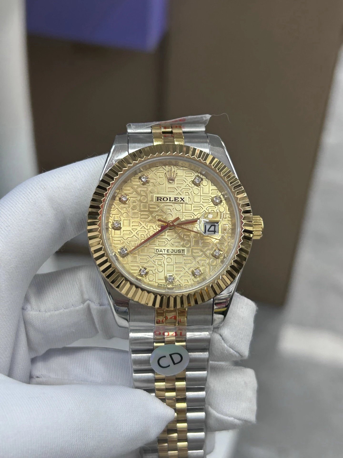 Rolex Datejust bicolor horloge met gouden patroon wijzerplaat