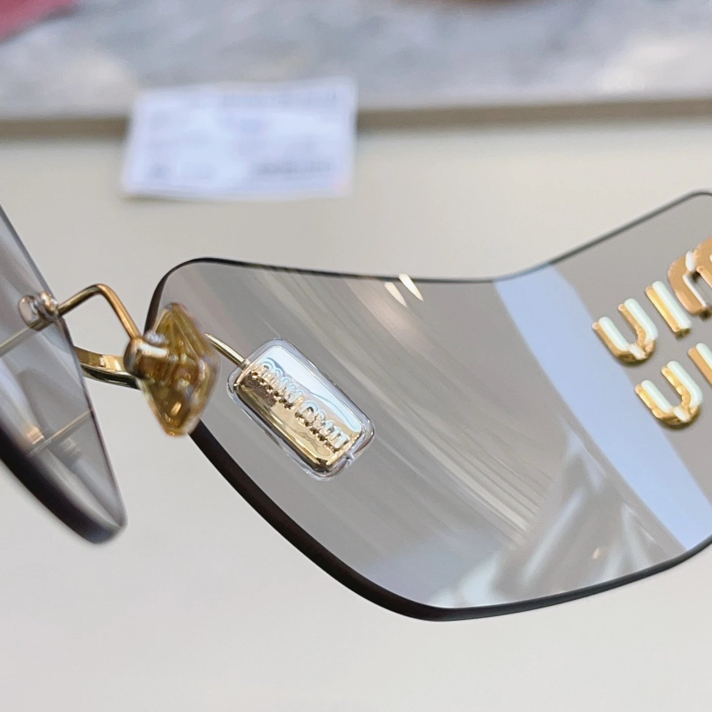 Miu Miu SMU 54Y Sunglasses 80-14-110 — Photo 8