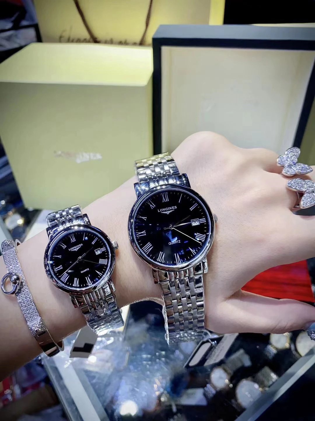 Longines Quartz Watches with Black Roman Numeral Dials and Silver-Tone Bracelets