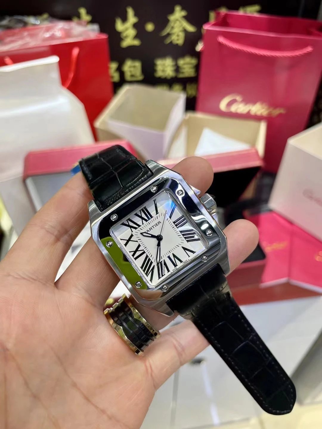 Zegarek Cartier Santos z czarnym skórzanym paskiem Wariant B
