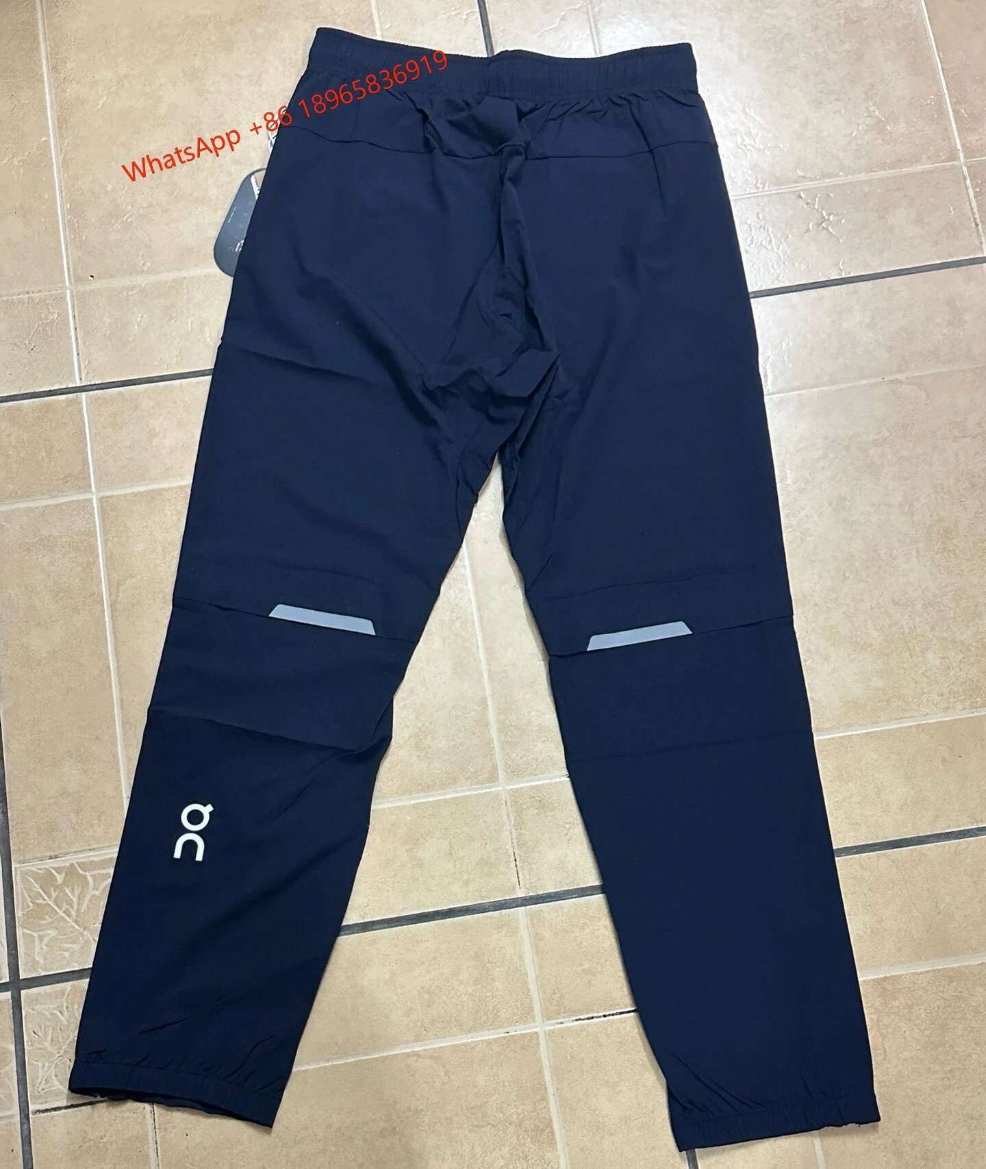 On Jackets Hooded Full-Zip Running Jacket — Tannin Blue-Pants