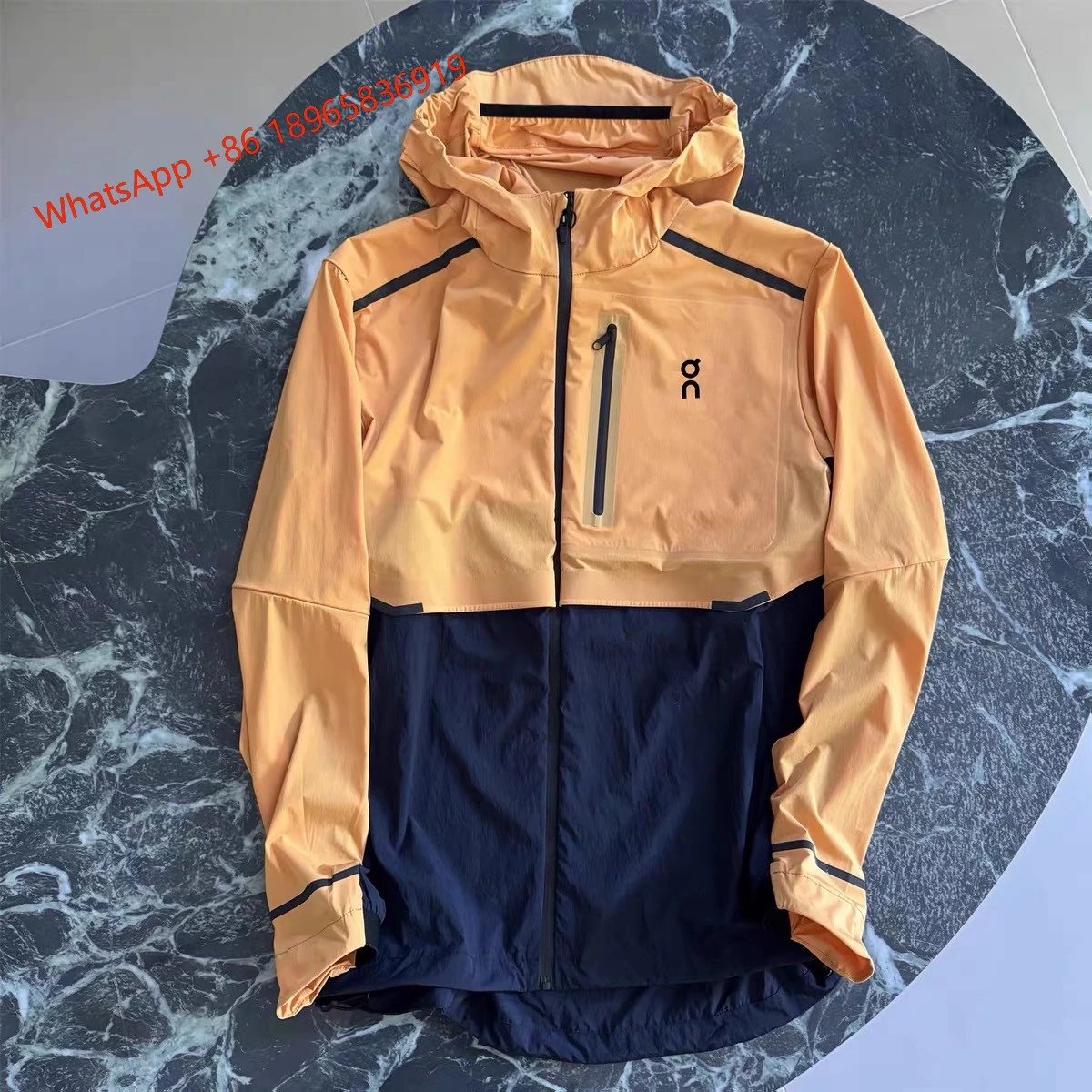 On Jackets Hooded Full-Zip Running Jacket — Orange