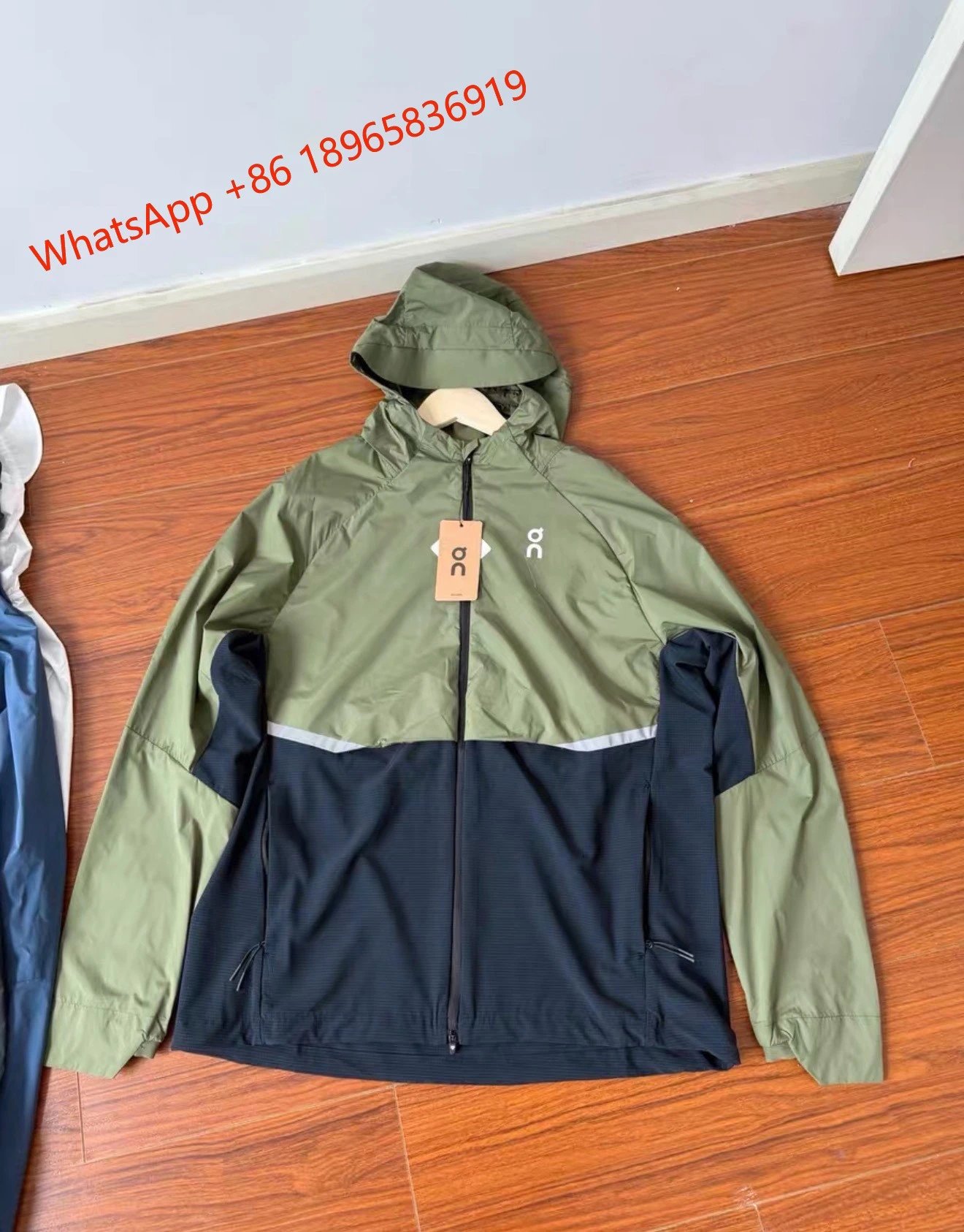 On Jackets Hooded Full-Zip Running Jacket — Taiga green