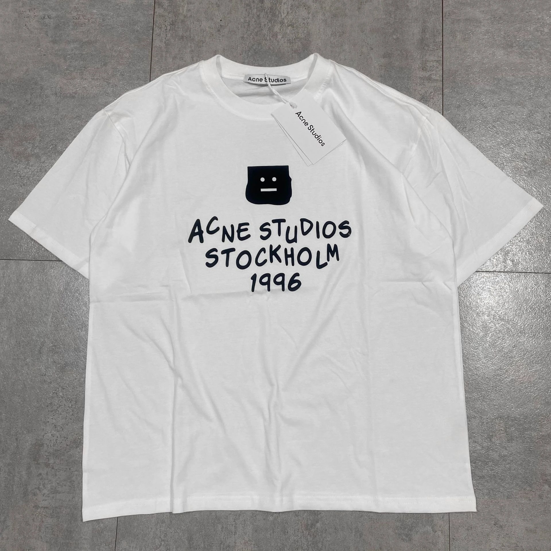 Acne Studios Stockholm 1996 T‑Shirt text in
