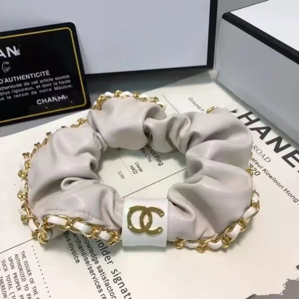 Prada Uncategorized Denim Triangle Plaque Headband — 36