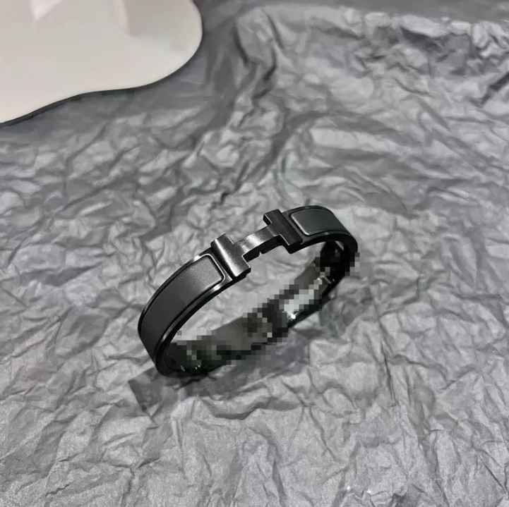 Hermès Clic H Grey Enamel Gold Tone Bangle