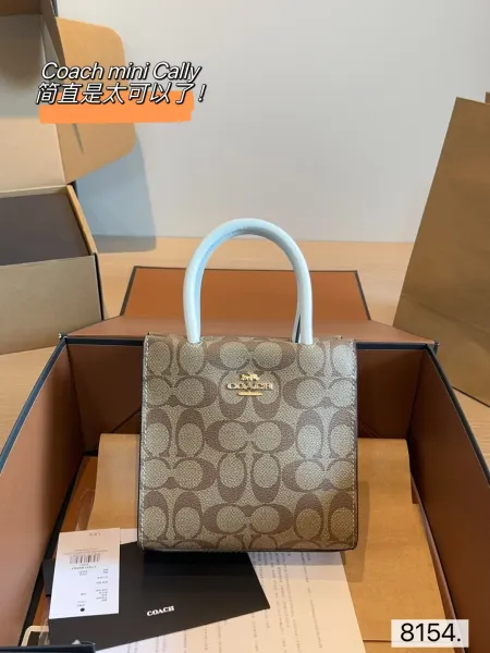 Coach Mini Cally Signature Canvas Handbag with Sky Blue Handles - 1
