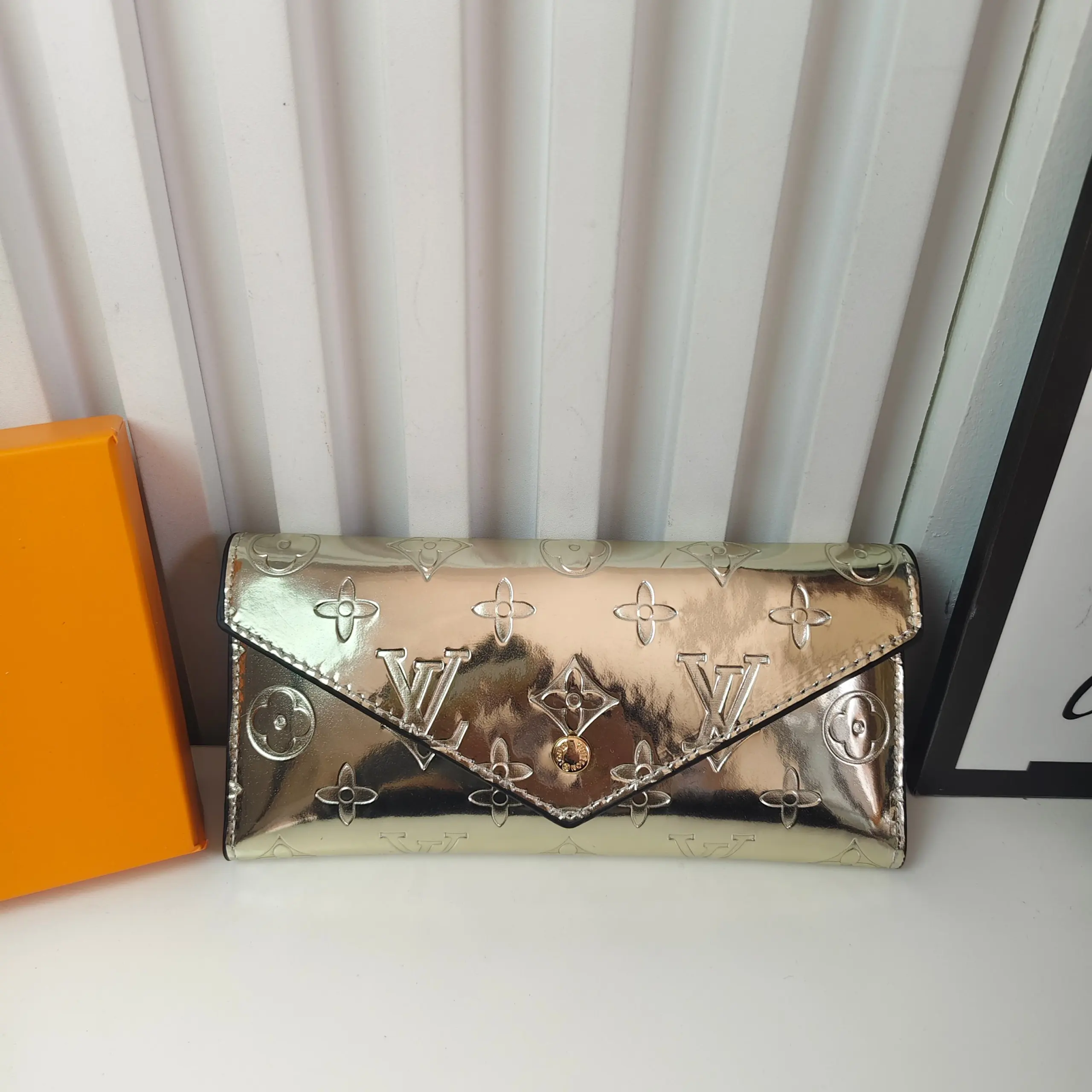Louis Vuitton Gold B