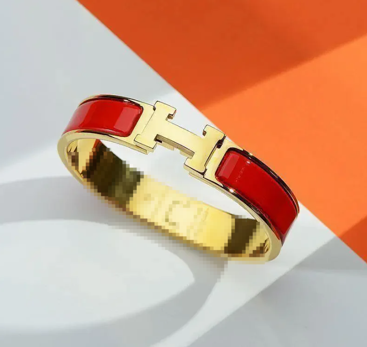 Hermès Clic H Grey Enamel Gold Tone Bangle