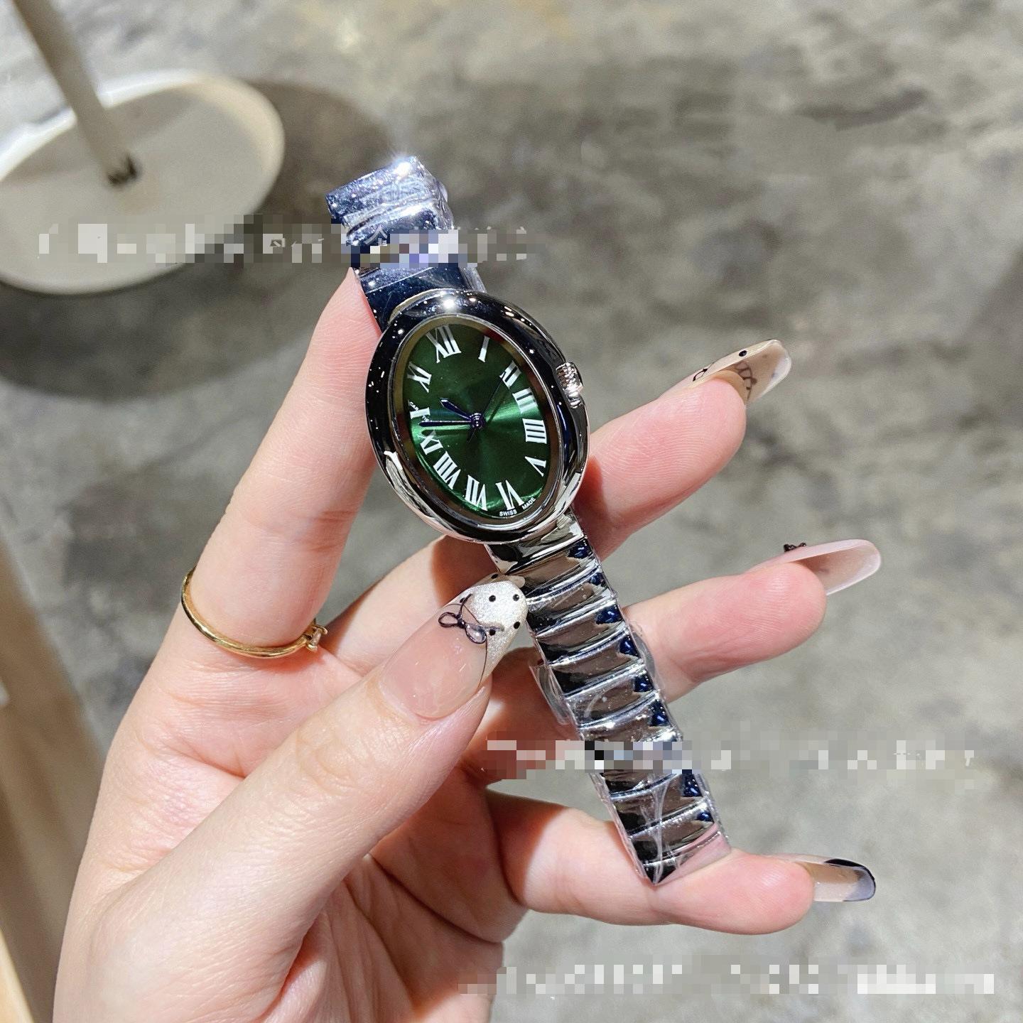 Silver shell green surface