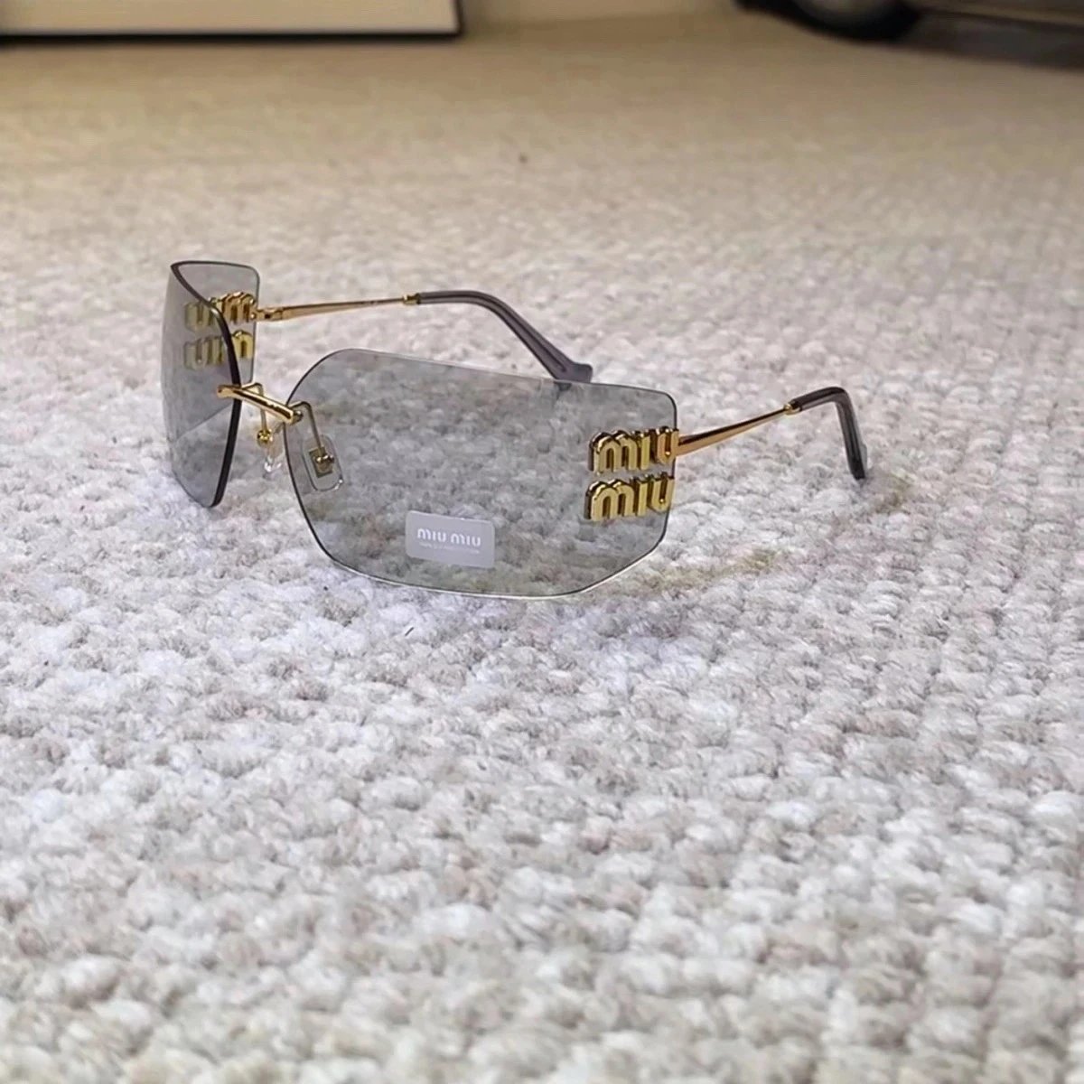 Miu Miu Rimless Metal Sunglasses Gold Grey
