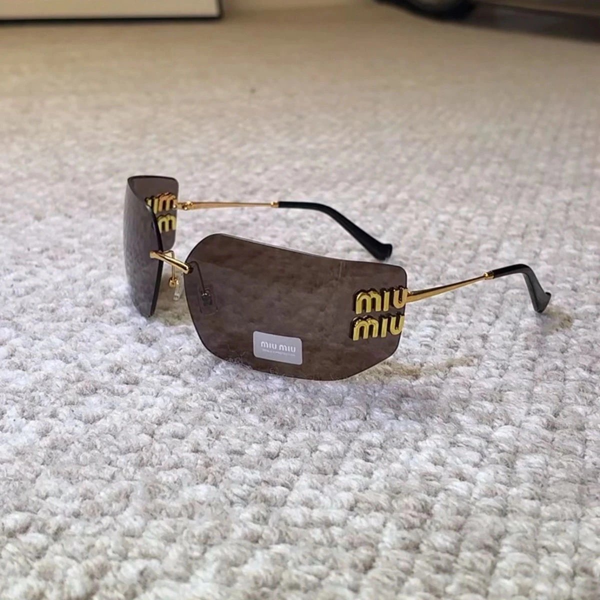 Miu Miu Rimless Metal Sunglasses Gold Brown