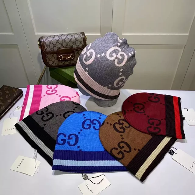 Gucci Hats GG monogram knit beanie with striped ribbed cuff product detail image 1