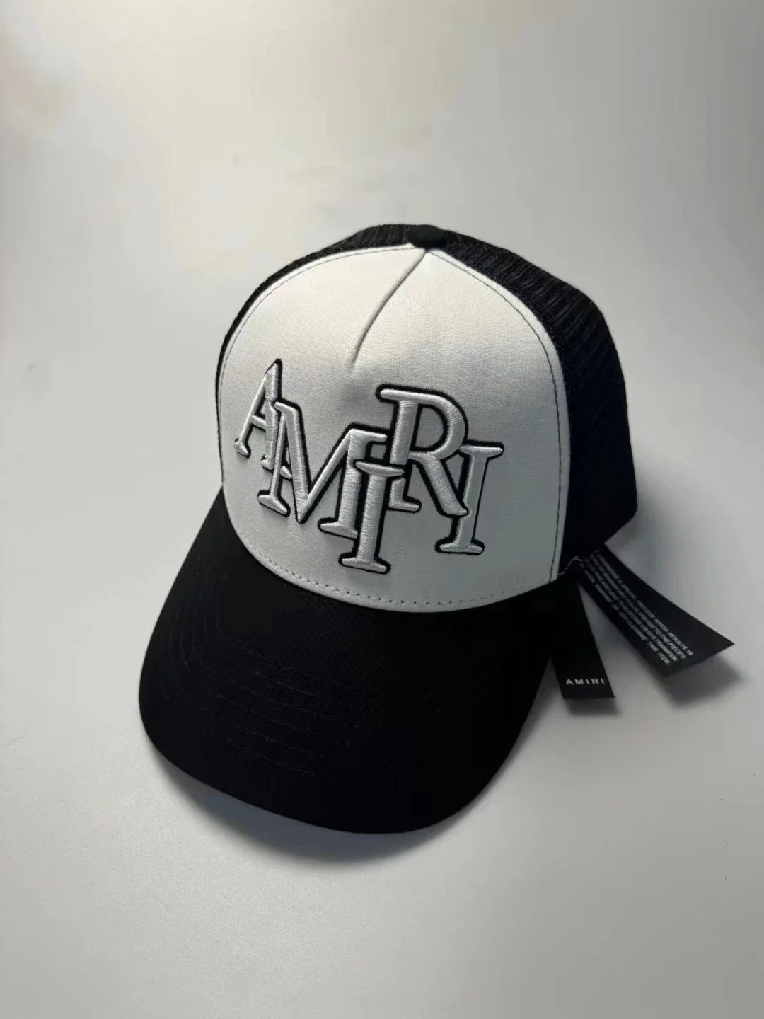 AMIRI Crossed-Letter Embroidered Mesh Trucker Hat