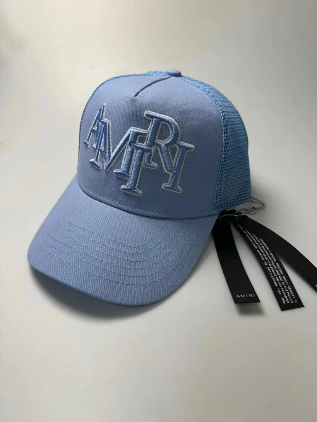 AMIRI Light Blue Stacked Logo Trucker Cap