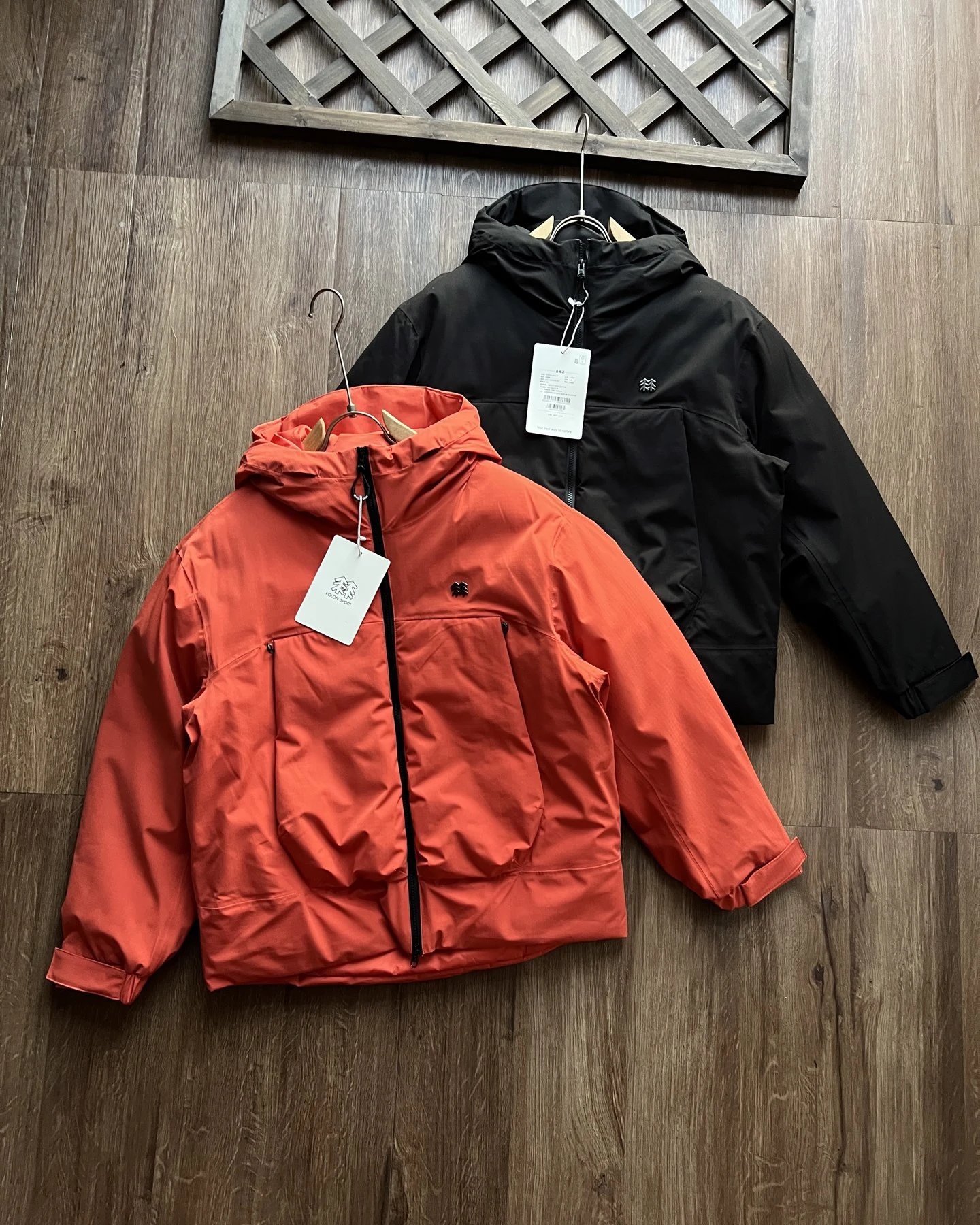 Hooded mid length goose down jacket for both men and women
