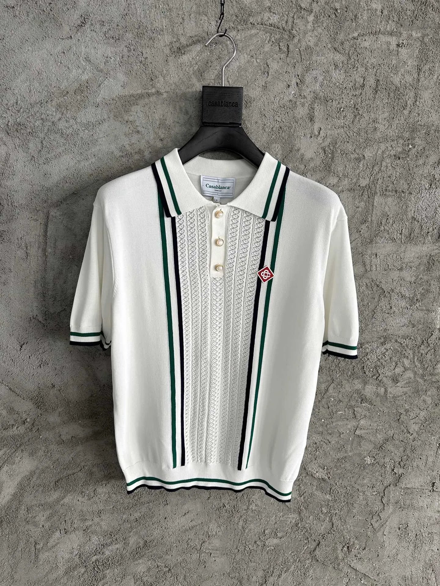 White Polo Shirt with Green and Black Stripes