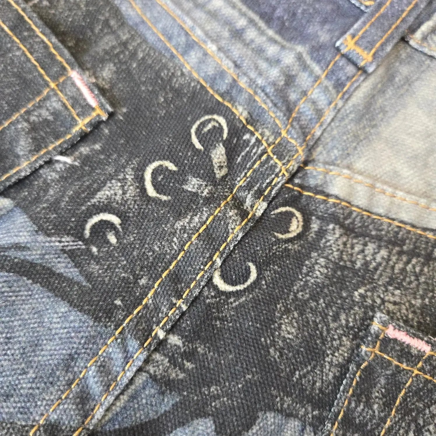Denim Tears x Levi's Distressed Moon Motif Jeans