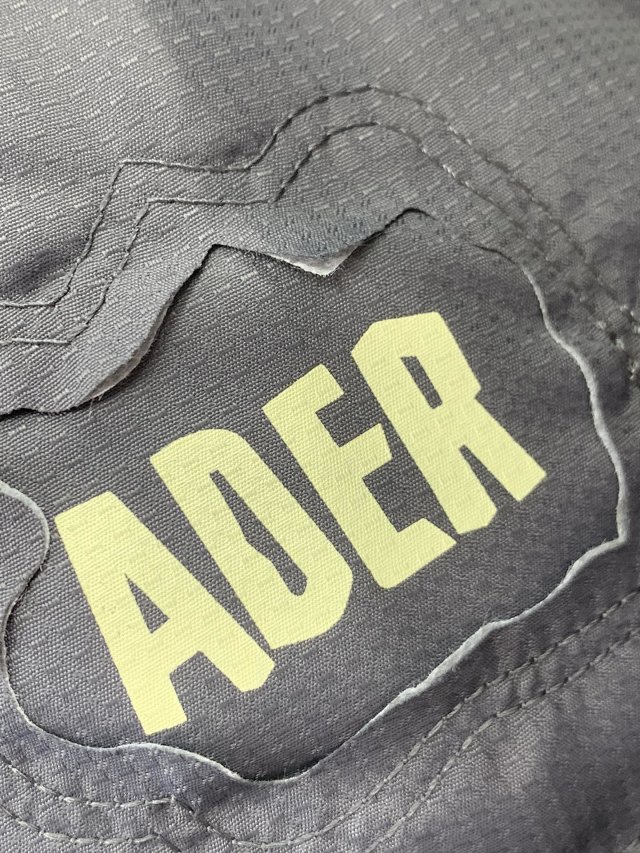 韩国设计师品牌、前后左右不对称：ADER 磁吸mask卡扣 不规则设计 男女同款羽绒服 团购价499元包邮（天猫2158元） 买手党-买手聚集的地方