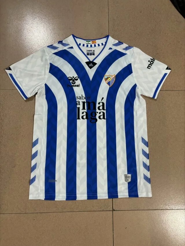Hummel Málaga CF 2023-24 Home Jersey Blue and White Striped Football Shirt - 1