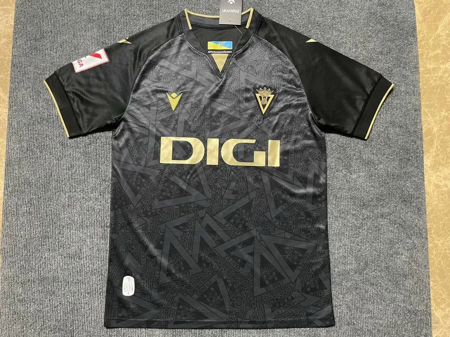 Macron Cádiz CF 2023-24 Third Jersey Black / Gold - 9