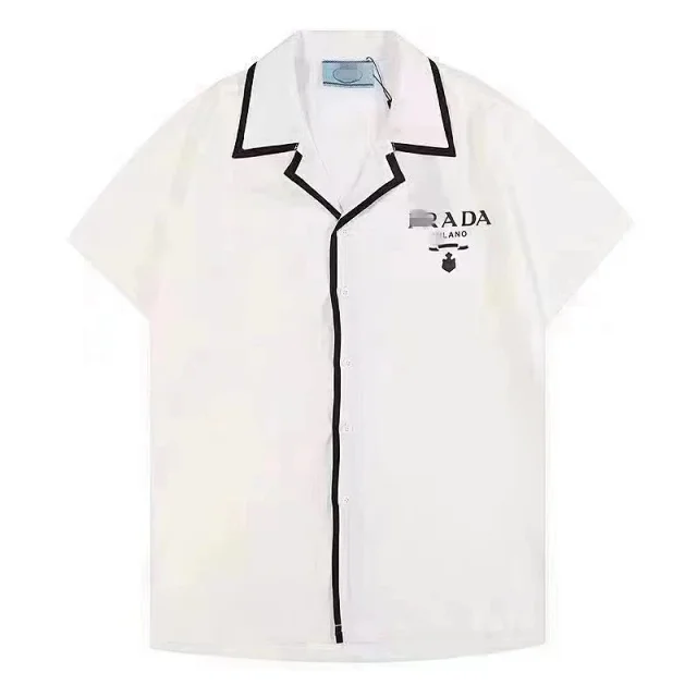 Prada Shirts Short-sleeve collared button-up with logo plaque or graphic print product detail image 1