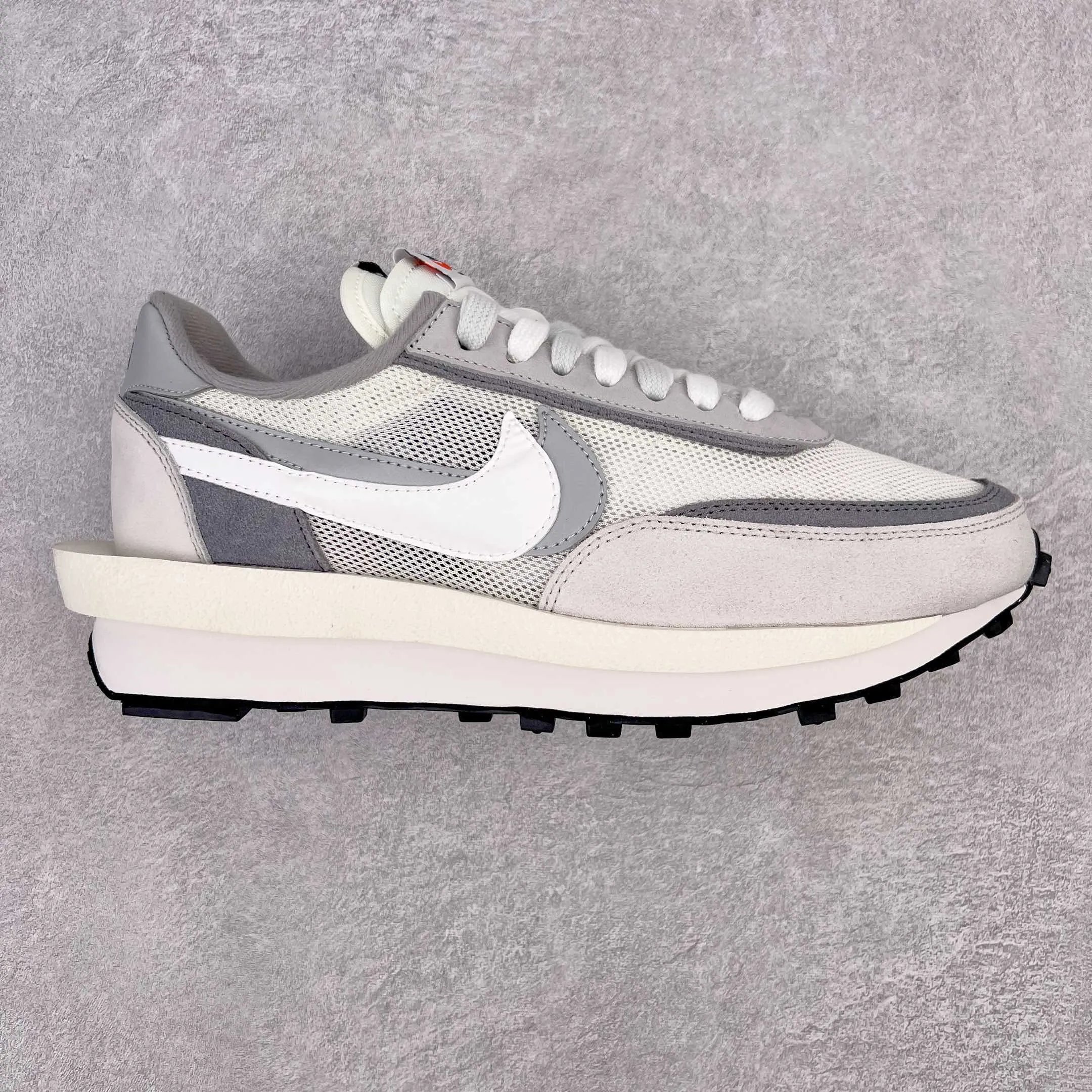 Nike Sneakers Sacai Collaboration Layered Double-Swoosh variant SOURCE-sku:131594705527