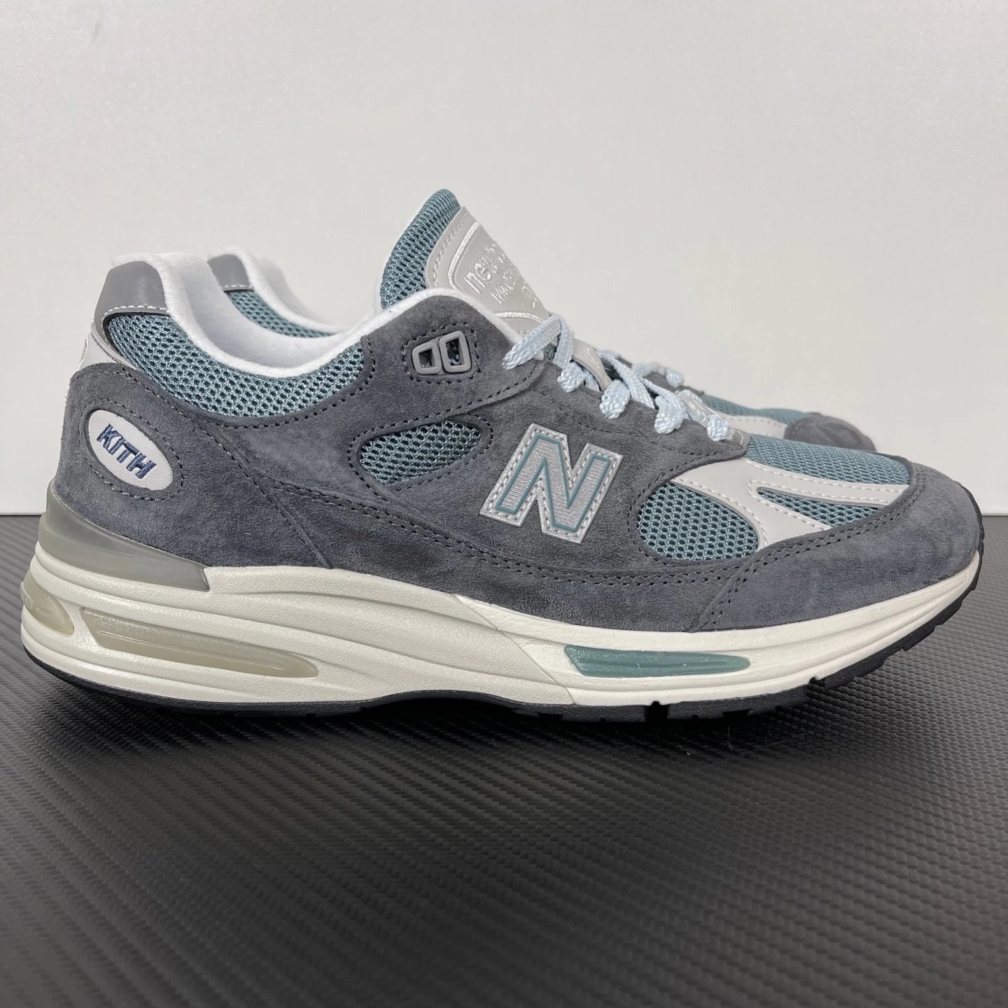 New Balance Multiple models shown — NB991V2 gray-blue U991KH2